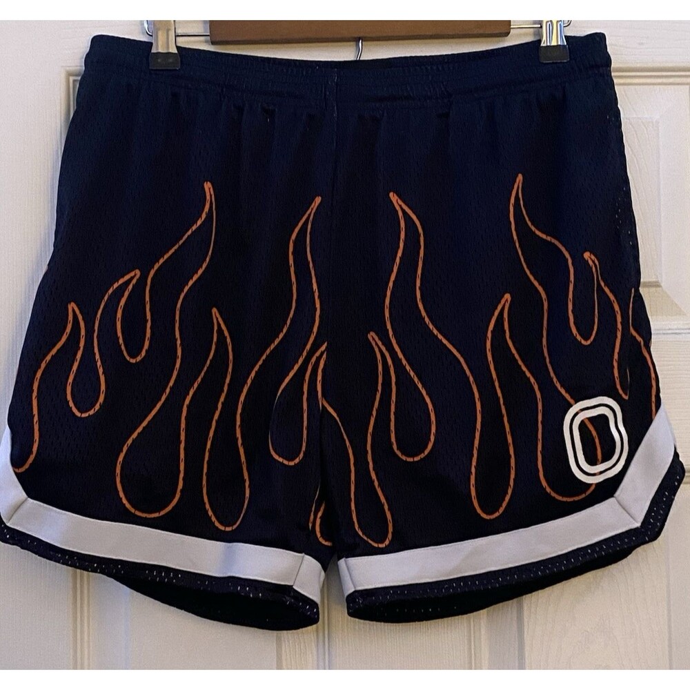 Overtime Black basketball shorts with orange flame graphics & white logo size M